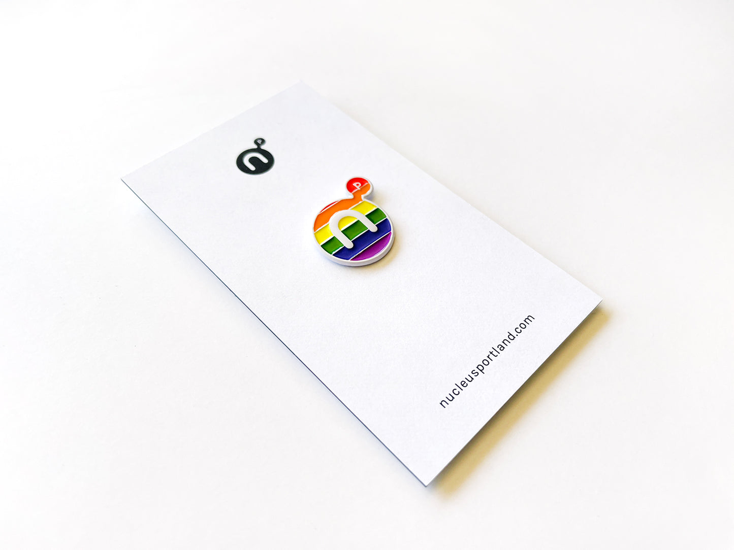 Nucleus Rainbow Pin