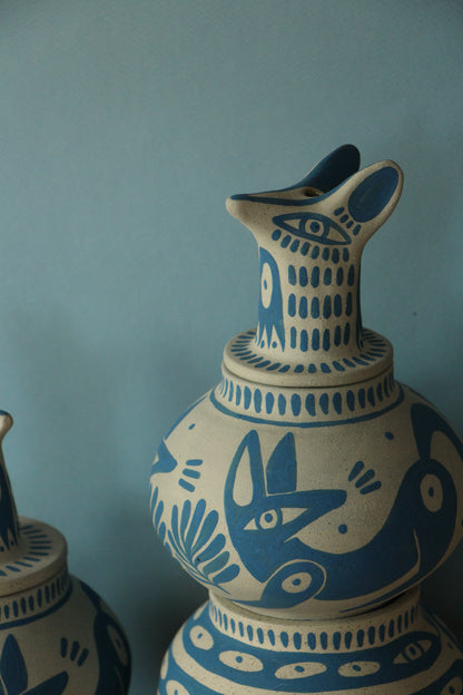 Perro y Arena - La Urna de los Coyotes y la Serpiente Azul